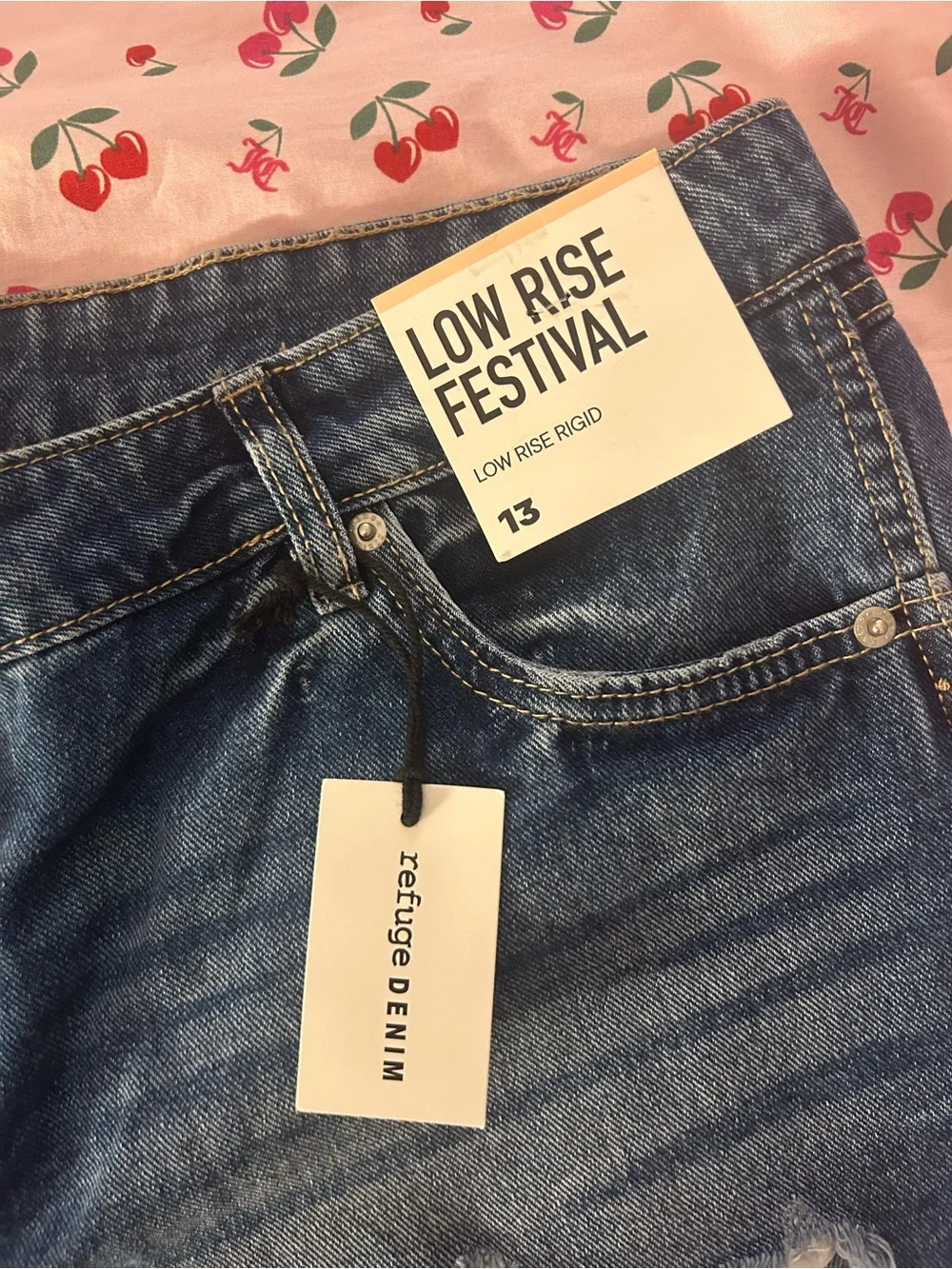 Low-Rise Dark Blue Denim Cutoff Shorts with Distressed Hem